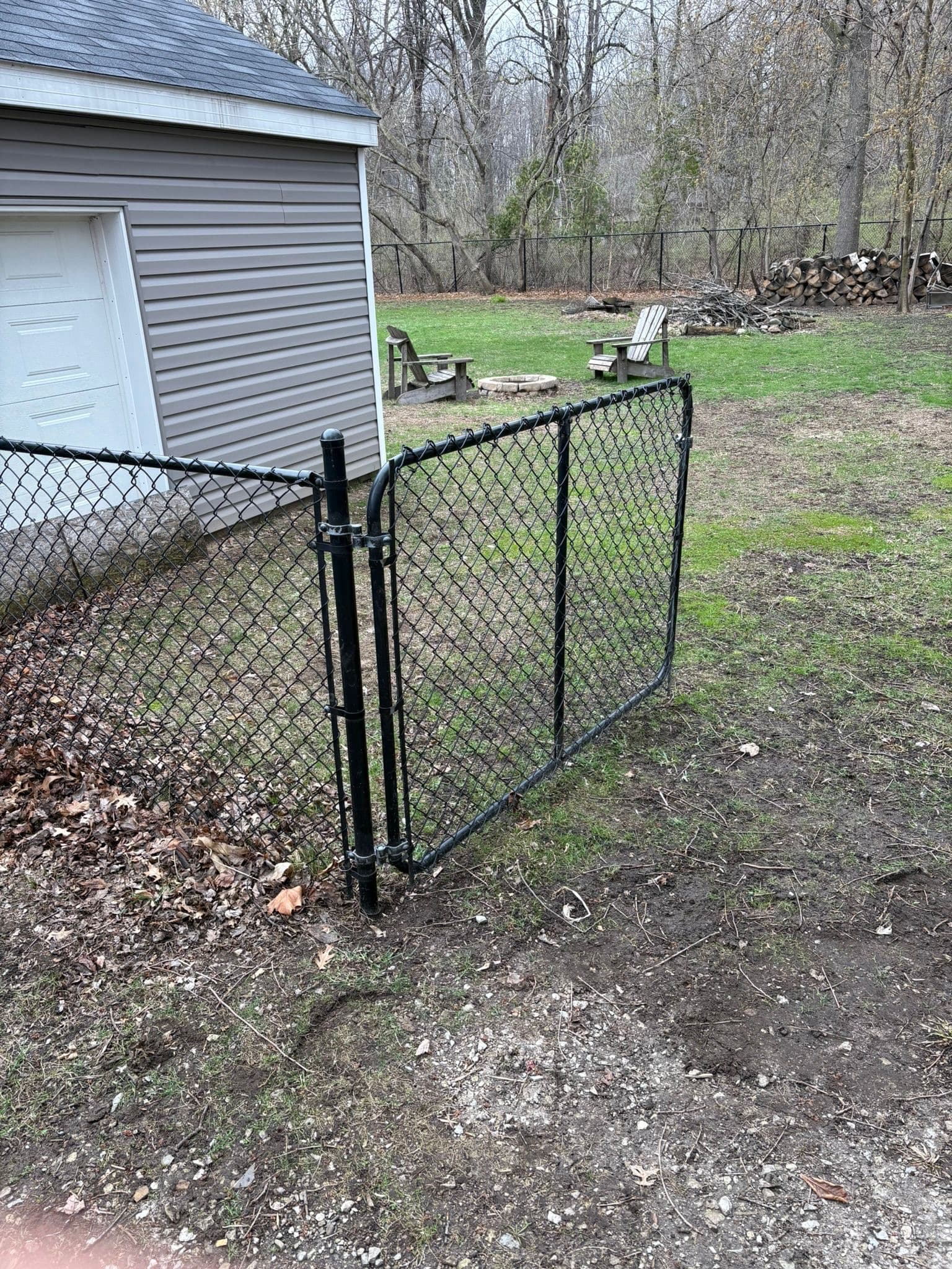 Black chain link fence gate enclosure