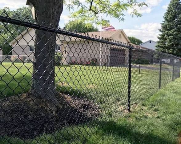 Commercial chain link fence with flag