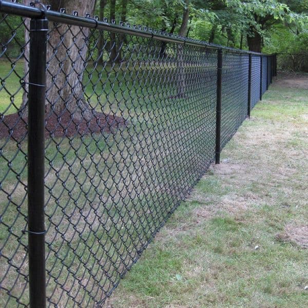 Full view of black chain link fence line