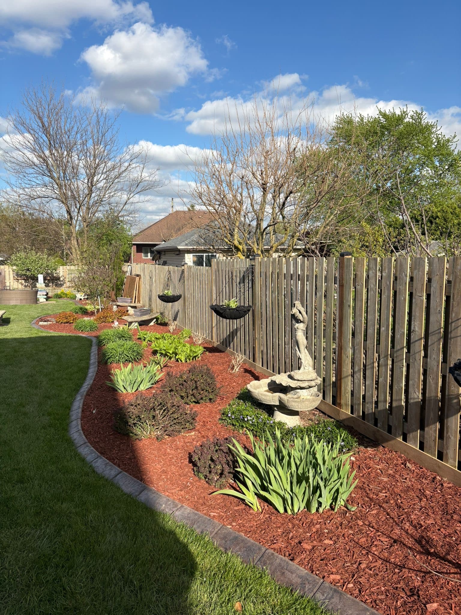 Damaged wood fence gate installation